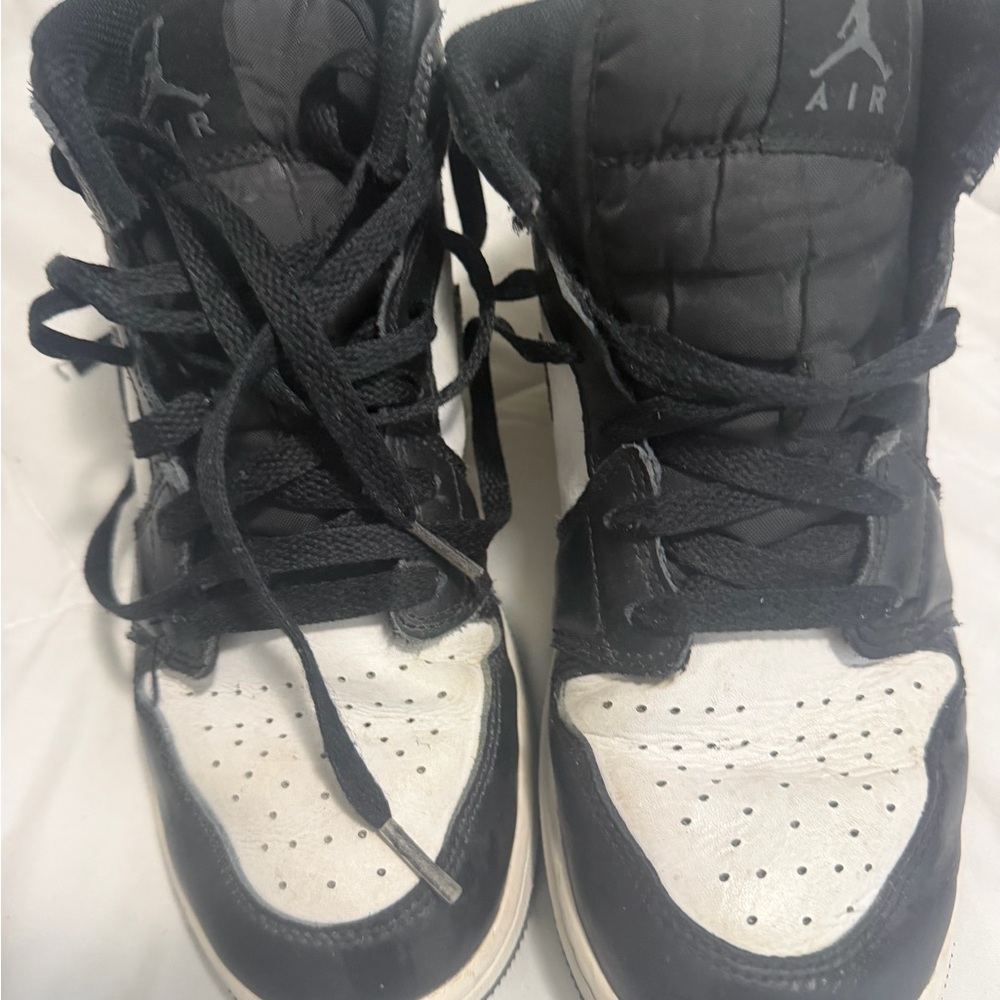 Jordan Kids Black and White High-Top Sneakers